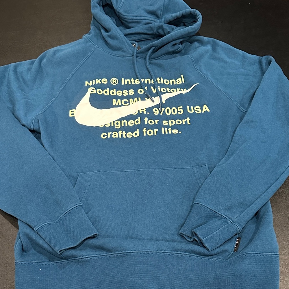 Nike Blue Crewneck Hoodie with White Swoosh Graphic